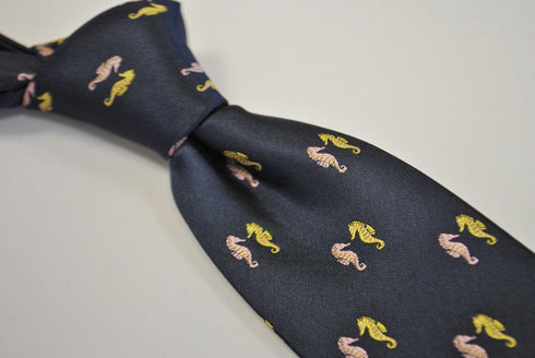 navy tie with seahorse design